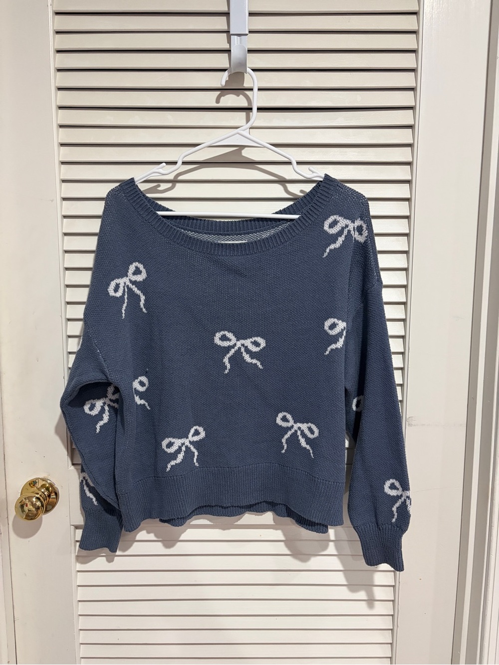 Hollister Blue Knit Off-the-Shoulder Sweater with White Bow Motif